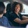 two women in a car carpooling